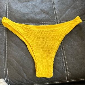 Yellow ribbed bikini bottoms size med.